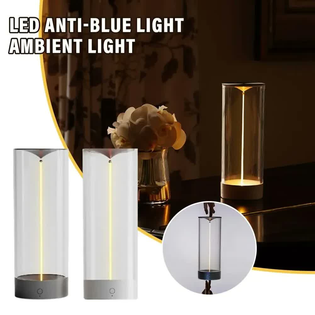 Minimalist Column Table Lamp, tall clear column lamps with vertical light, lit on a table
