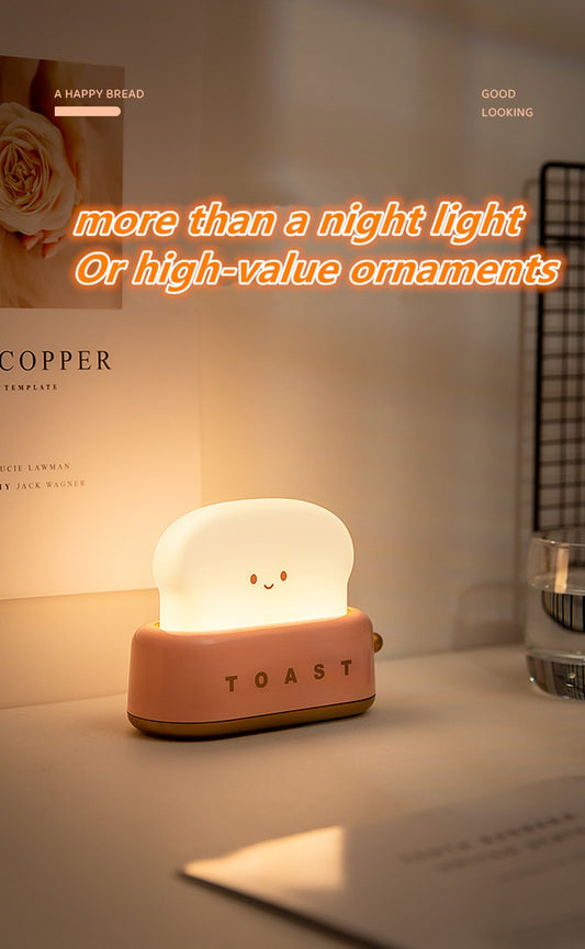 Bread Maker Night Light, pink toaster base, lit bread slice